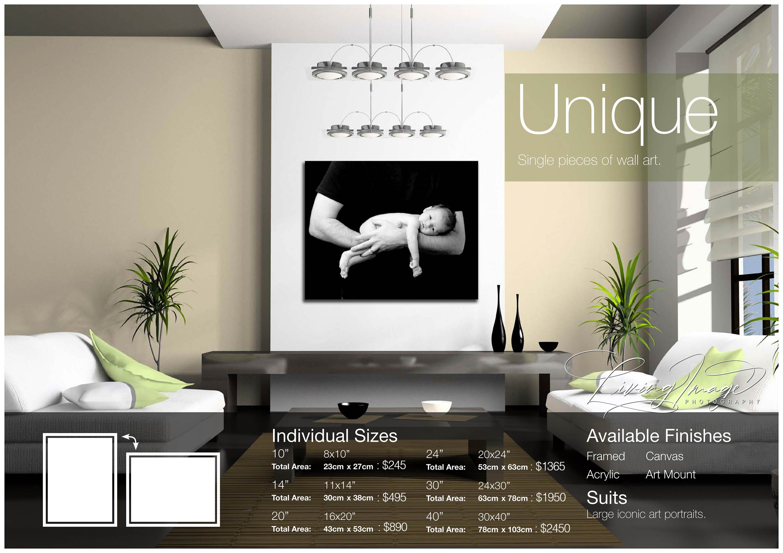 A single black and white newborn portrait displayed as large wall art in a living room